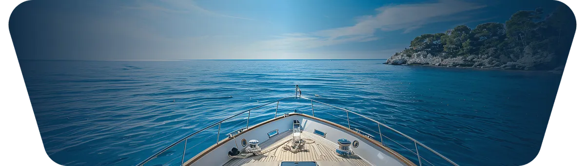 Boat bow moving through blue water