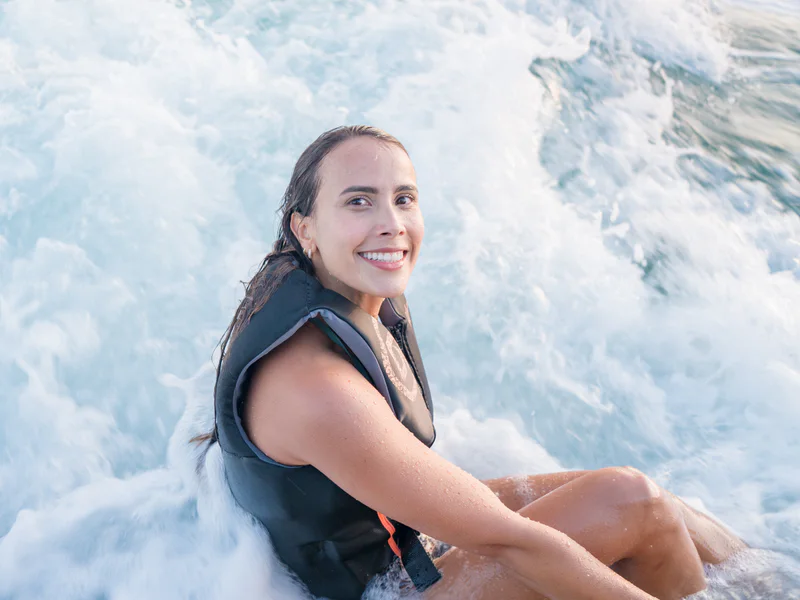 Wakehouse Miami guest wearing a life vest on the water